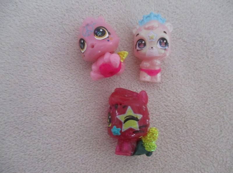 A plastic egg carton containing twelve Hatchimals CollEGGtibles