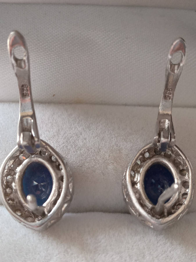 A Pair Of Sterling Silver Blue And White Cz Earrings