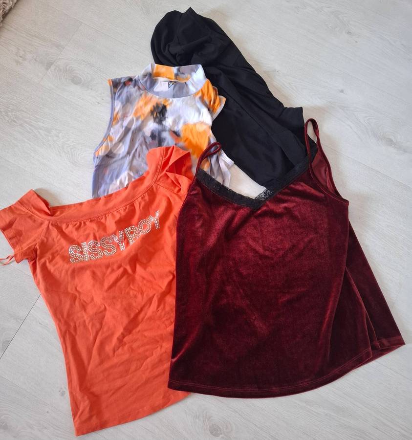 4 new tops ...size Medium