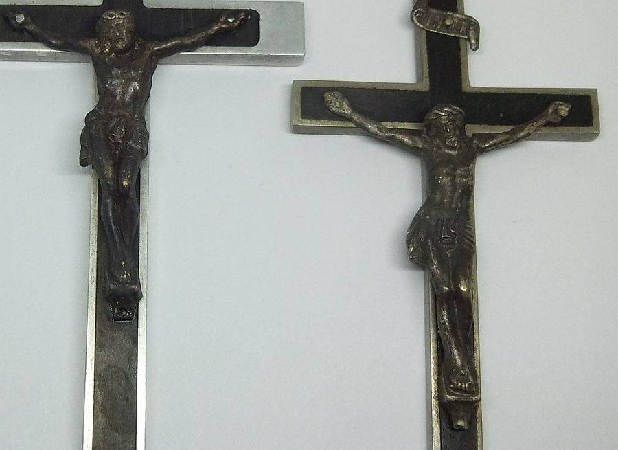 Two large detailed vintage metal crucifixes inlayed with wood