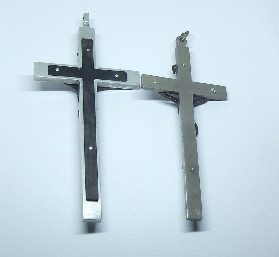 Two large detailed vintage metal crucifixes inlayed with wood