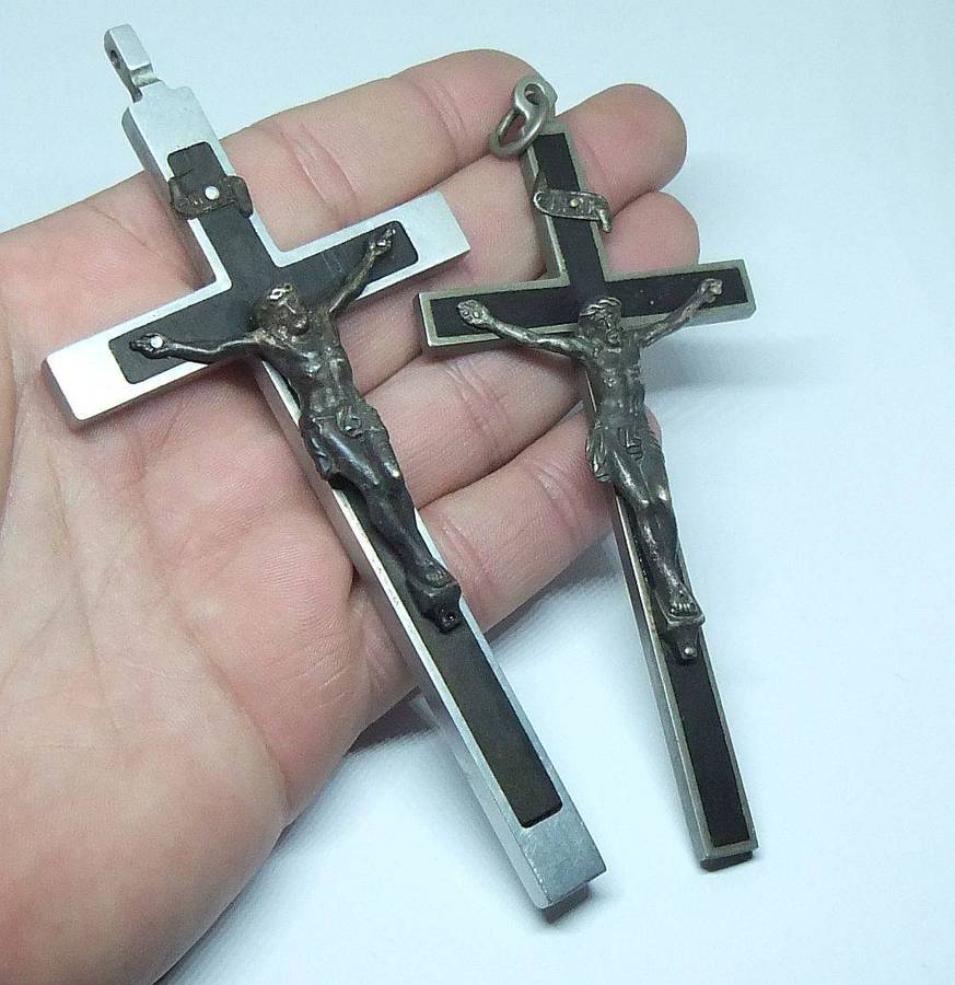 Two large detailed vintage metal crucifixes inlayed with wood