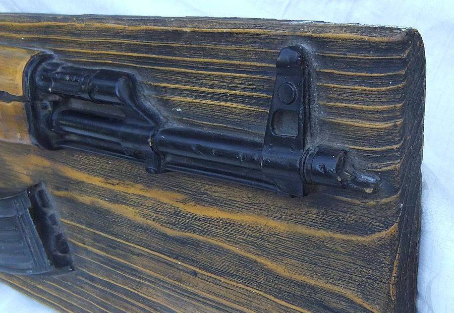 A rare vintage late 1980`s hard foam wall mount demonstrational mold of an AK47 assault rifle