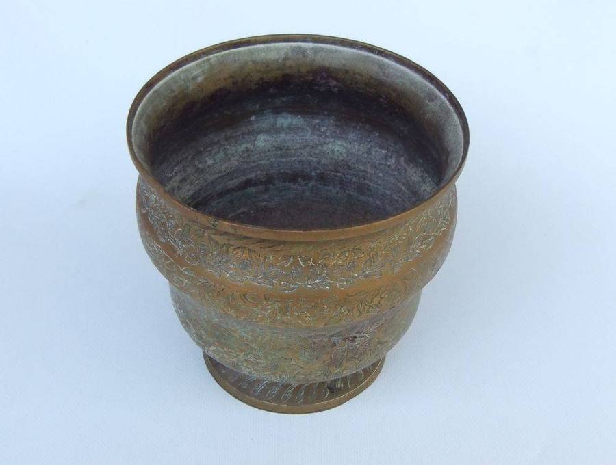 A highly detailed vintage bronze or brass planter possibly of Indian origin