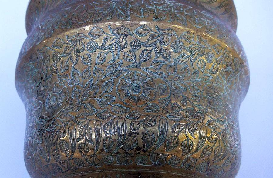 A highly detailed vintage bronze or brass planter possibly of Indian origin