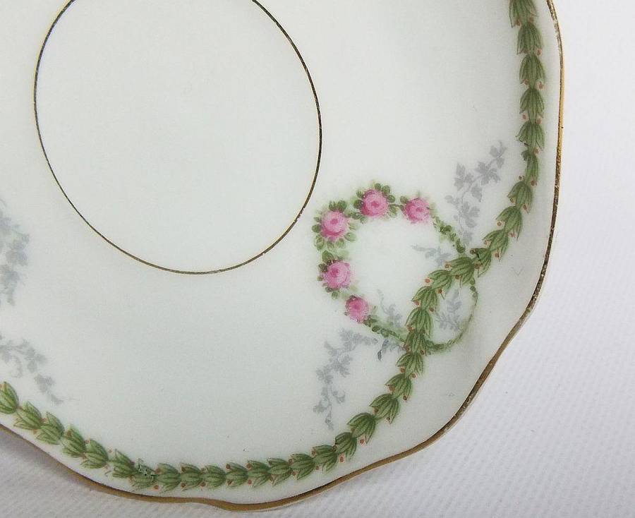 An early 20th centrury Bavarian porcelain duo in the Chrysantheme pattern , espresso sized