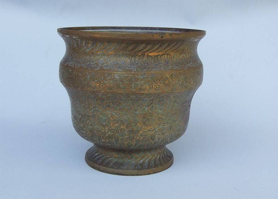 A highly detailed vintage bronze or brass planter possibly of Indian origin