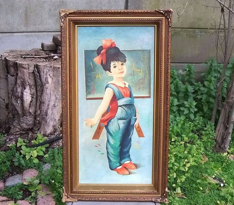 A beautiful vintage original oil on board painting of a young girl in an exquisite old frame