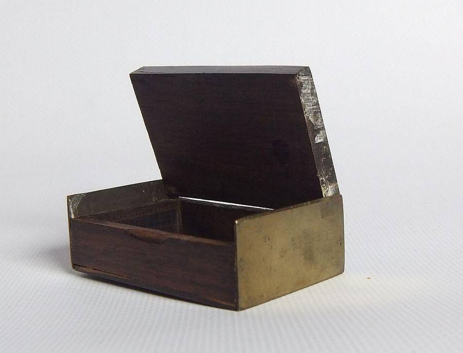 A vintage brass bell with wooden handle and wooden box with brass fittings and inlay