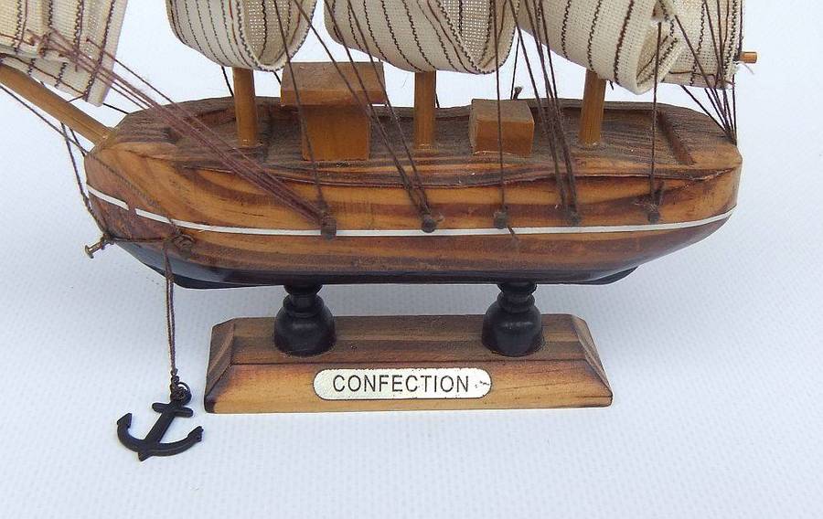 A vintage wood and cloth sail model of the Confection sailing ship