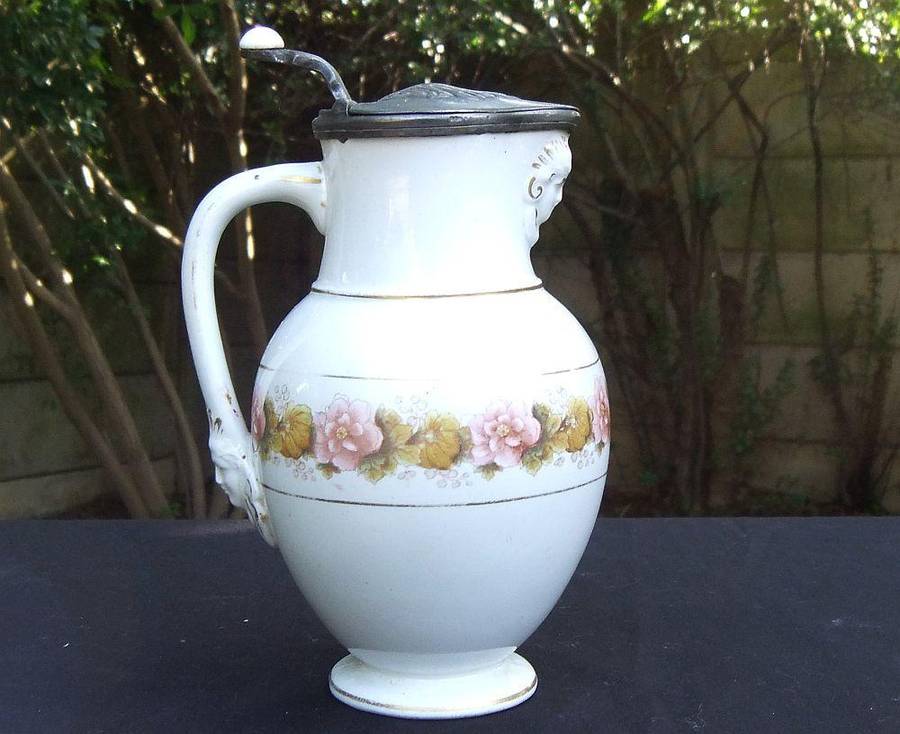 A rare antique mid 1800`s tankard with hinged pewter lid