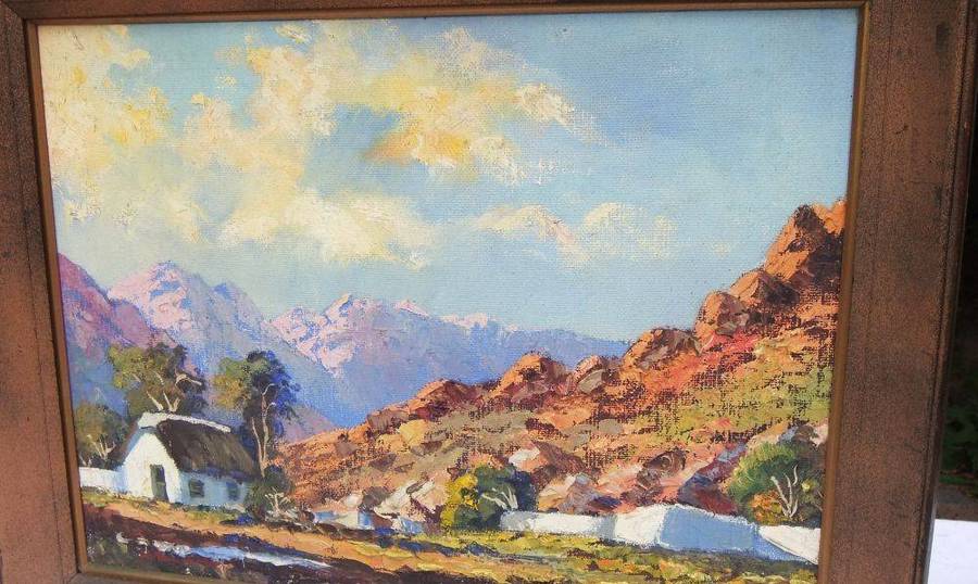 A large signed original oil on board painting depicting a farmstead amid a mountainous landscape