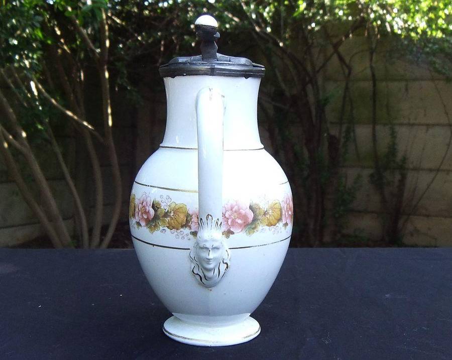 A rare antique mid 1800`s tankard with hinged pewter lid