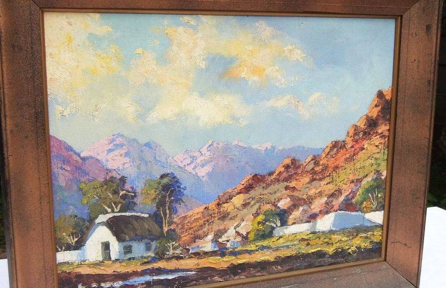A large signed original oil on board painting depicting a farmstead amid a mountainous landscape