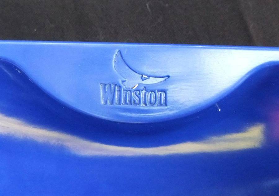 A pair of vintage Winston cigarette advertising ashtrays