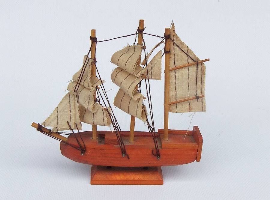 An interesting small vintage model of a sail ship with cloth sails