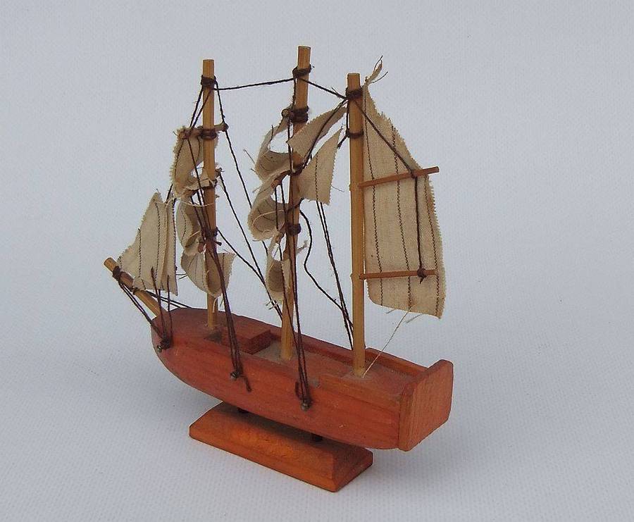 An interesting small vintage model of a sail ship with cloth sails