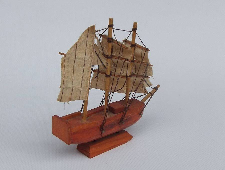 An interesting small vintage model of a sail ship with cloth sails
