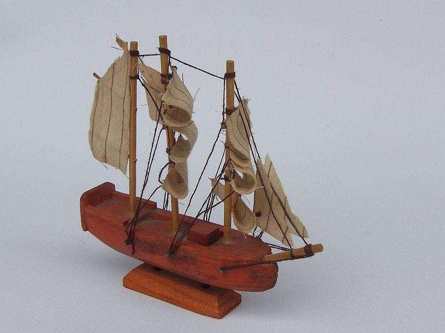 An interesting small vintage model of a sail ship with cloth sails