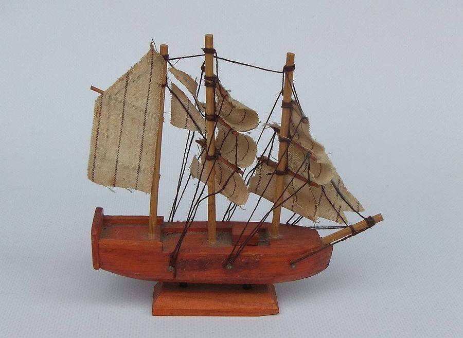 An interesting small vintage model of a sail ship with cloth sails