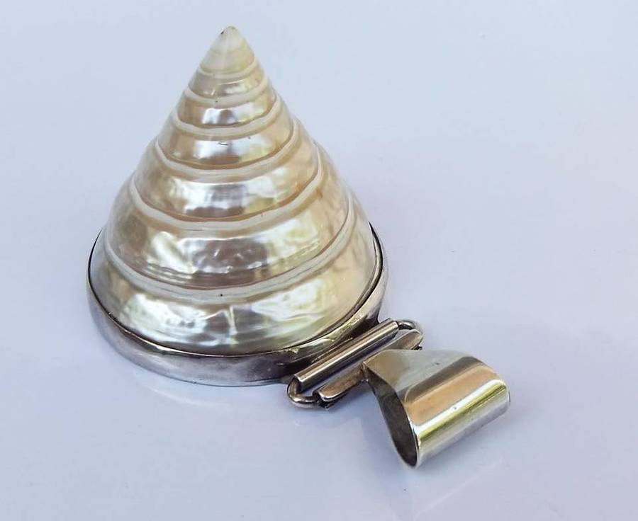An exquisite unique Throchius Mother of Pearl pyramid top sea shell pendant set in sterling silver
