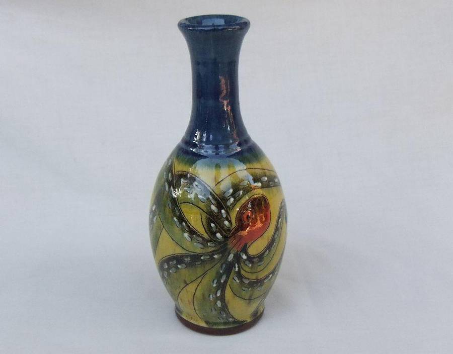 A signed vintage handmade pottery vase with octopus motif
