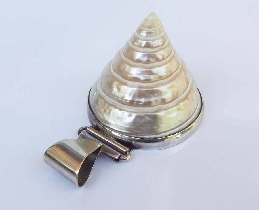 An exquisite unique Throchius Mother of Pearl pyramid top sea shell pendant set in sterling silver