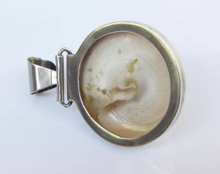 An exquisite unique Throchius Mother of Pearl pyramid top sea shell pendant set in sterling silver