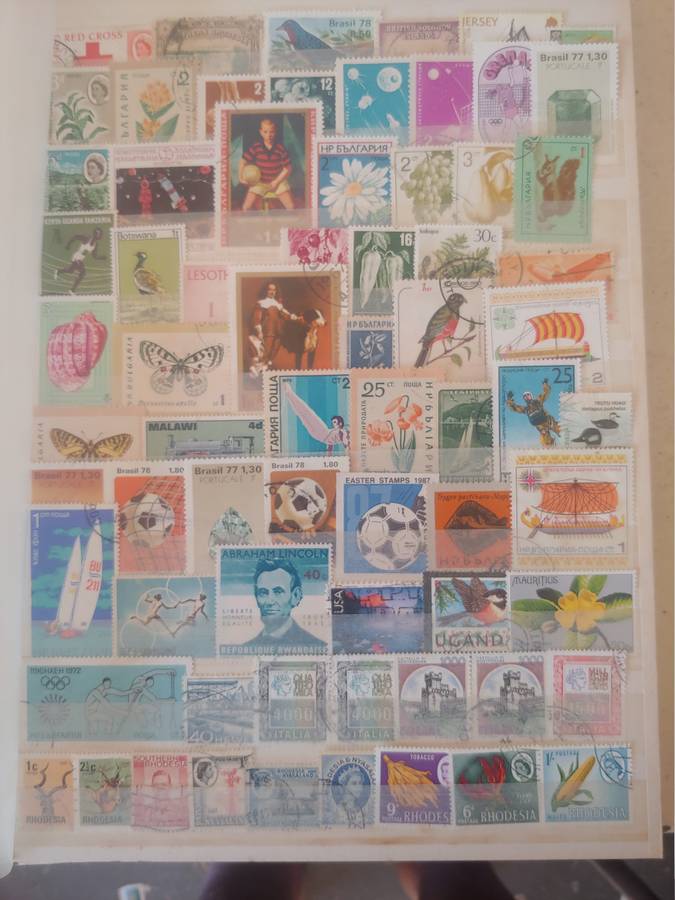 A4 USED LIGHTHOUSE ALBUM LOADED WITH MIXED WORLD STAMPS 16/32 PAGES NOT ALL SHOWN