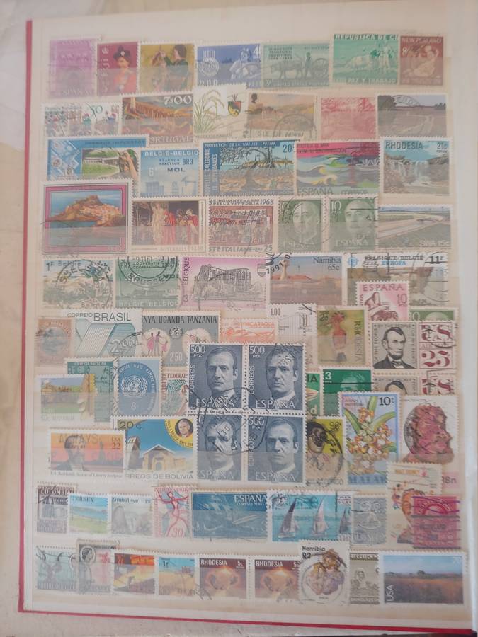 A4 USED LIGHTHOUSE ALBUM LOADED WITH MIXED WORLD STAMPS 16/32 PAGES NOT ALL SHOWN