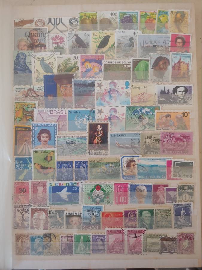 A4 USED LIGHTHOUSE ALBUM LOADED WITH MIXED WORLD STAMPS 16/32 PAGES NOT ALL SHOWN