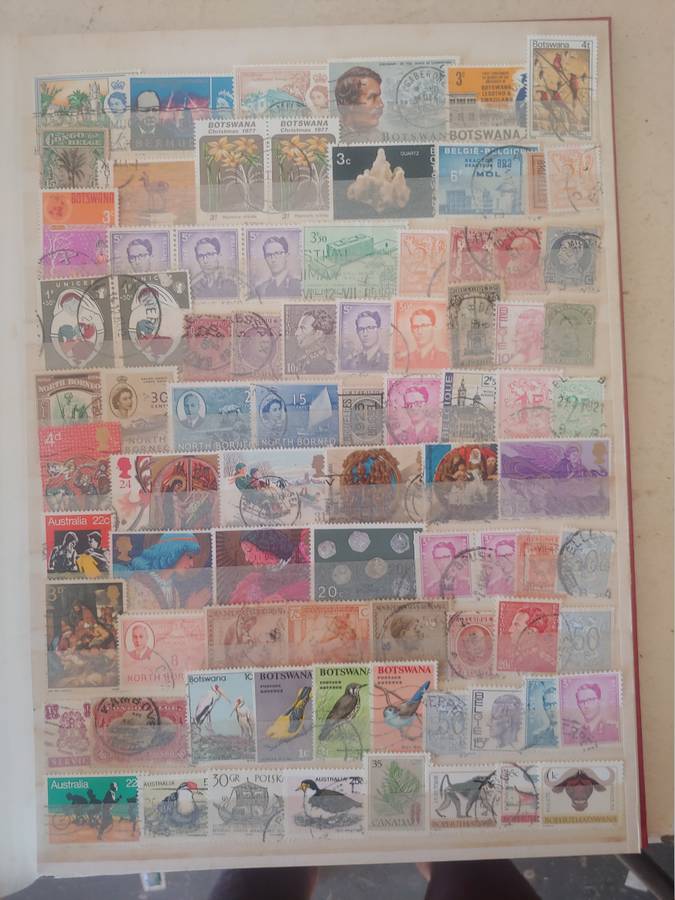 A4 USED LIGHTHOUSE ALBUM LOADED WITH MIXED WORLD STAMPS 16/32 PAGES NOT ALL SHOWN