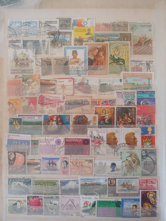 A4 USED LIGHTHOUSE ALBUM LOADED WITH MIXED WORLD STAMPS 16/32 PAGES NOT ALL SHOWN