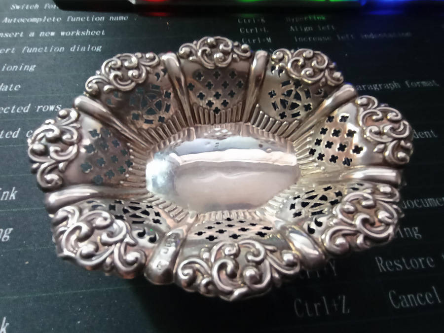 Birmingham hallmarked silver. Small.pierced Bon Bon dish weigh 37 grams .. selling as per scan