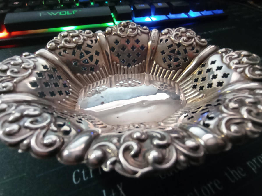 Birmingham hallmarked silver. Small.pierced Bon Bon dish weigh 37 grams .. selling as per scan