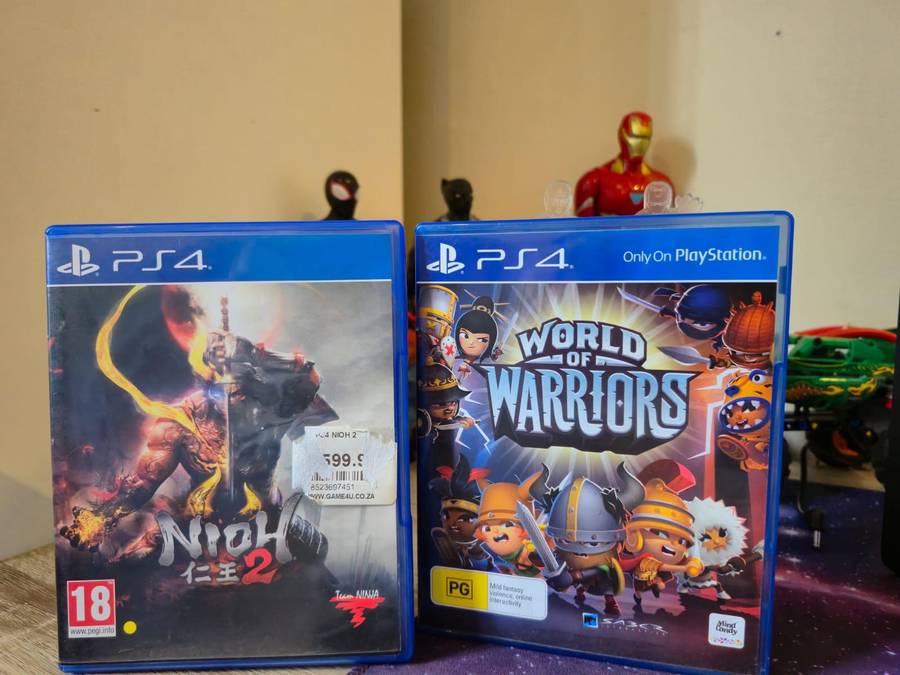 PS4 500GB Slimline, 2 Controllers, 4 Games (Pre-owned)