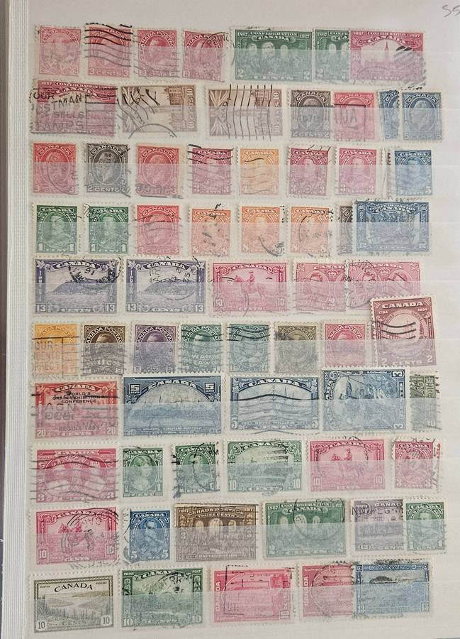 Canada mixed lot on album pages.