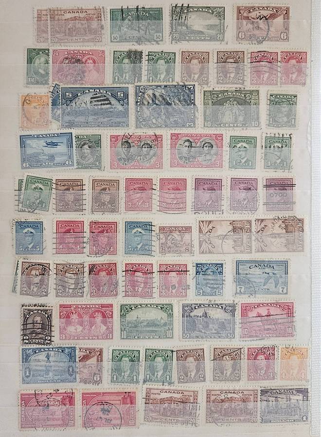 Canada mixed lot on album pages.