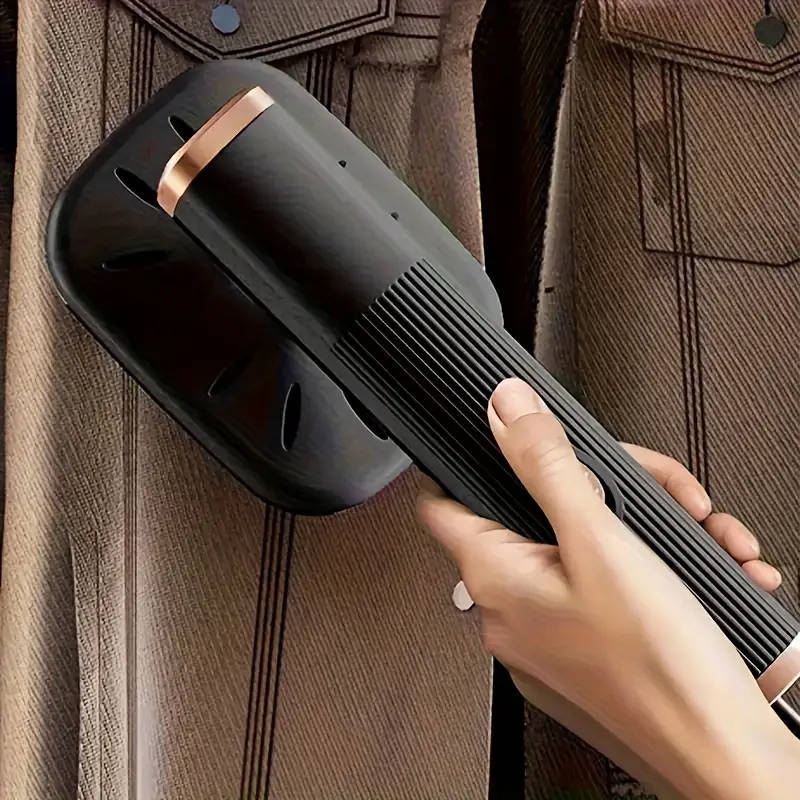 Portable handheld steamer/iron