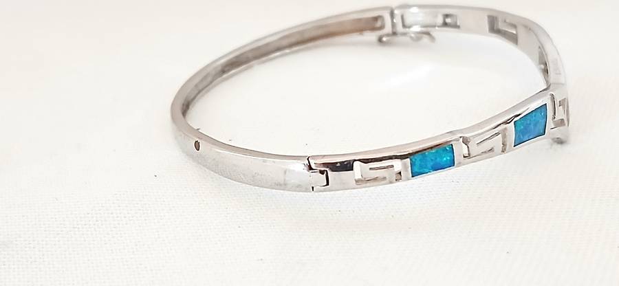 Sterling silver bangle with faux opals