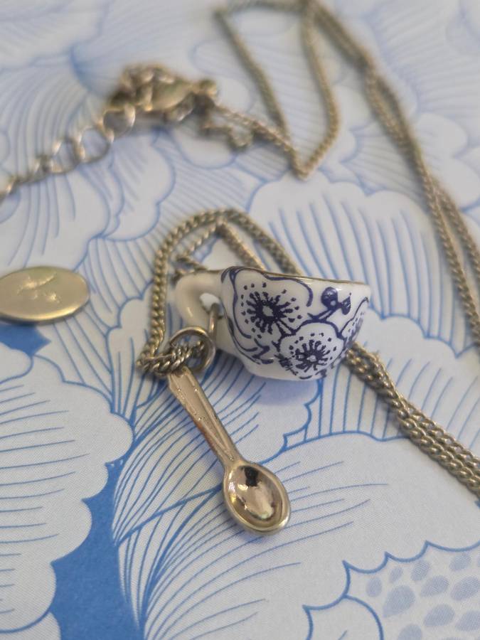 Necklace with cup and spoon pendant