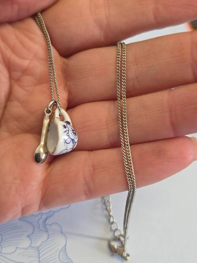 Necklace with cup and spoon pendant