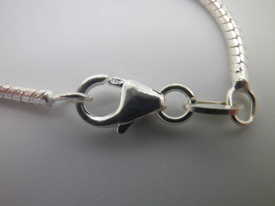 STERLING SILVER & TANZANITE NECKLACE. chain: 45cm long. 11g