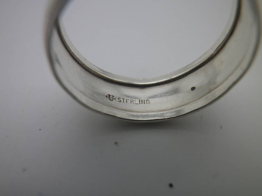 Sterling Silver Vintage Designer Ring.  Well made. Little engraved stars 2.7 grms Size: O 1/2