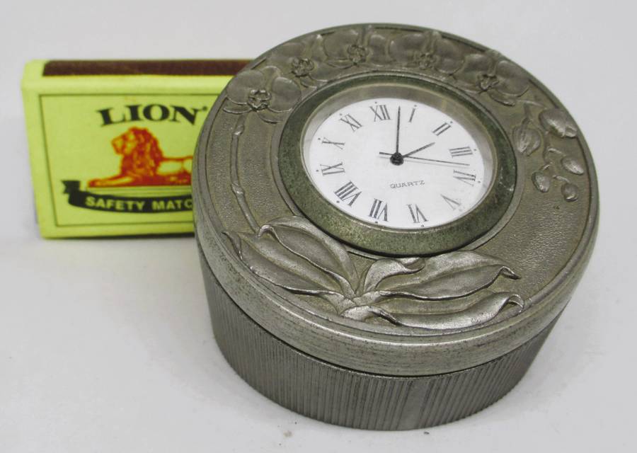 Vintage Miniature  Desk Clock set in decorated Tumasek Pewter holder. 60x 65mm