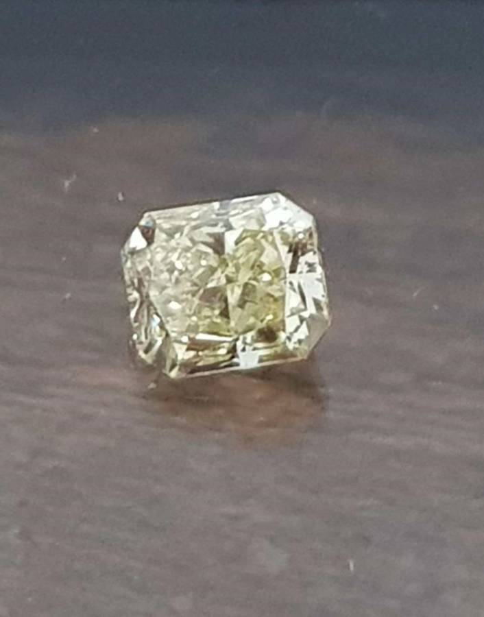 0.41cts Diamond Radiant Cut K/VVS2 **Certified**Fancy Yellow