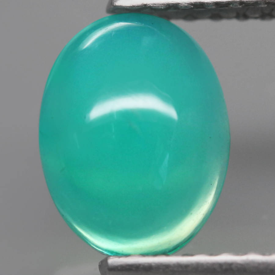 0.65Ct.  Opal Oval Cabochon Multi Colors Glittering Rainbow 3D! Ethiopian Natural