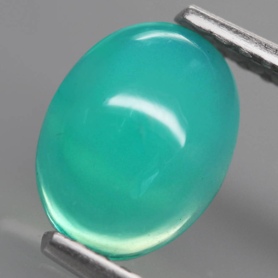 0.65Ct.  Opal Oval Cabochon Multi Colors Glittering Rainbow 3D! Ethiopian Natural