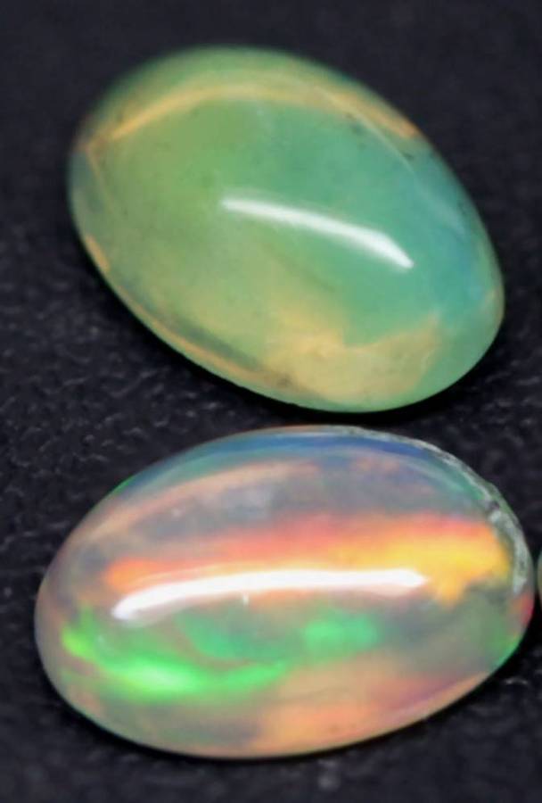 1.21Ct.Opal Oval Cabochon **4 Pieces**Multi Colors Glittering Rainbow 3D! Ethiopian  Natural