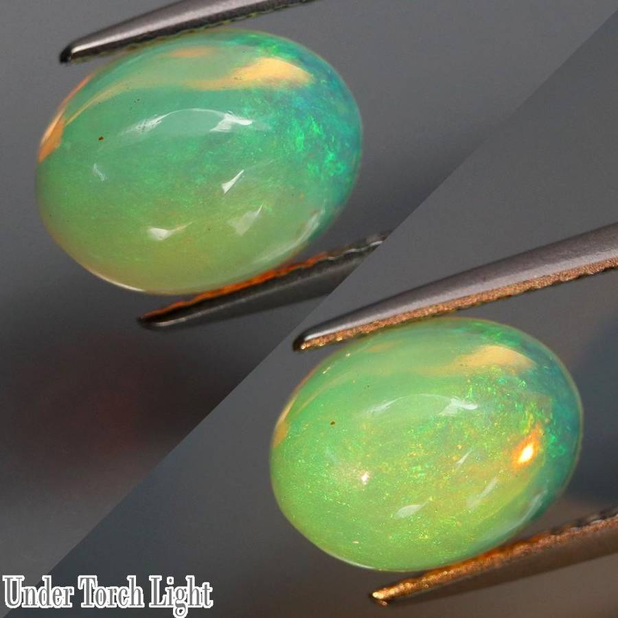 2.29Ct.Opal Oval Cab. Yellow & Rainbow Color Sparkling  Ethiopia
